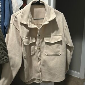 Cream blazer with button up front. Never worn